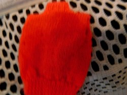 orange barbie sweater back